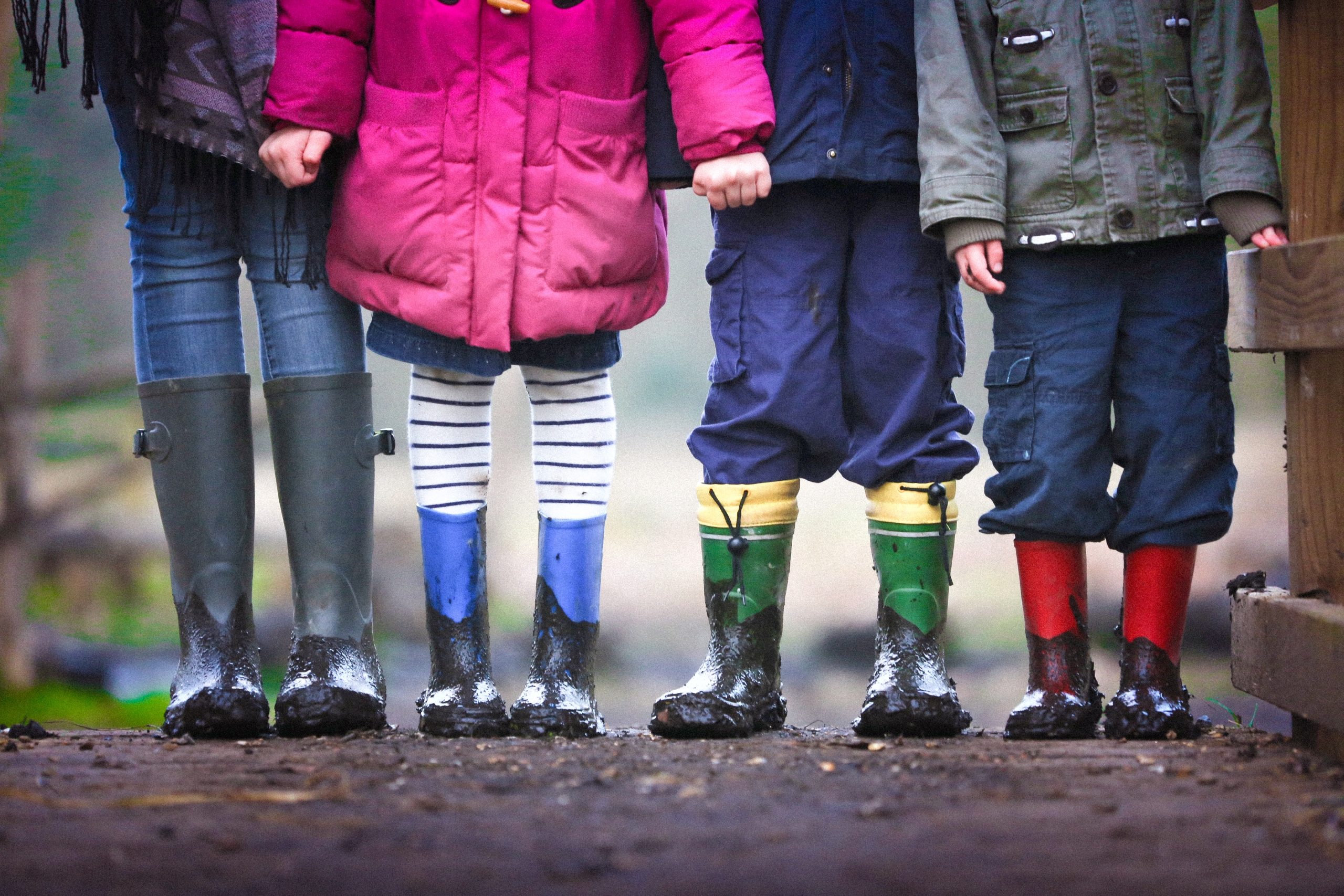 Kids outside with rain clothes